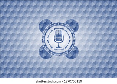 microphone icon inside blue emblem or badge with abstract geometric pattern background.