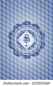 microphone icon inside blue emblem with geometric background.