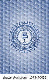 microphone icon inside blue emblem or badge with geometric pattern background.