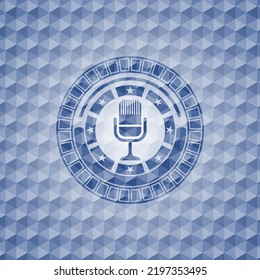 microphone icon inside blue emblem or badge with abstract geometric pattern background. 
