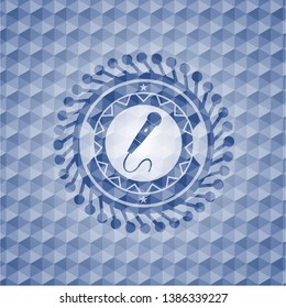 microphone icon inside blue hexagon emblem.