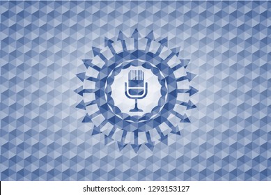 microphone icon inside blue polygonal emblem.