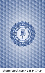 microphone icon inside blue polygonal emblem.