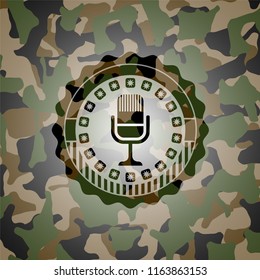 microphone icon inside camo emblem