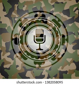 microphone icon inside camo emblem