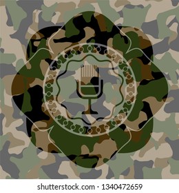 microphone icon inside camouflage texture