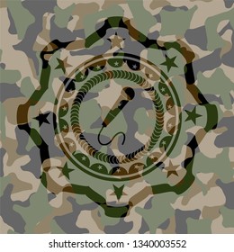 microphone icon inside camouflaged emblem