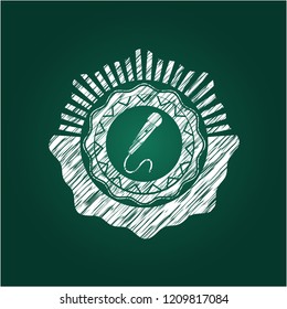 microphone icon inside chalkboard emblem