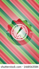 microphone icon inside christmas colors badge.