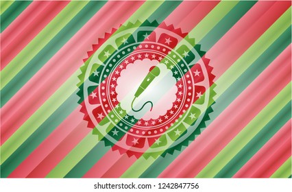 microphone icon inside christmas emblem background.