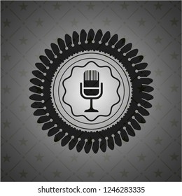 microphone icon inside dark emblem. Retro