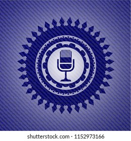 microphone icon inside denim background