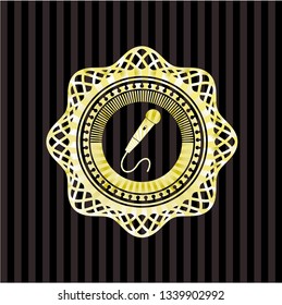 microphone icon inside gold badge or emblem