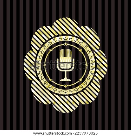 microphone icon inside golden badge. 