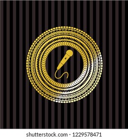 microphone icon inside golden emblem