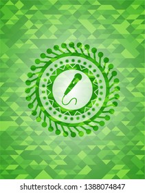 microphone icon inside green emblem with triangle mosaic background
