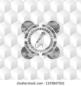 microphone icon inside grey badge with geometric cube white background