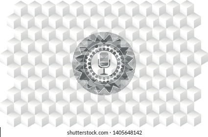 microphone icon inside grey badge with geometric cube white background