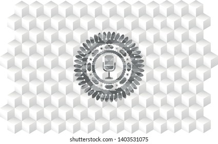 microphone icon inside grey emblem with cube white background