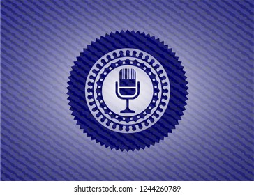 microphone icon inside jean background