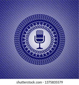 microphone icon inside jean background