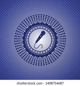 microphone icon inside jean background