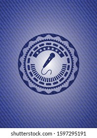 microphone icon inside jean background