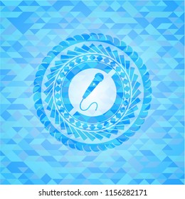microphone icon inside light blue emblem with mosaic ecological style background