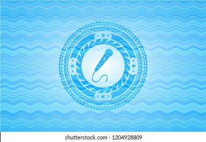 microphone icon inside light blue water wave style badge.