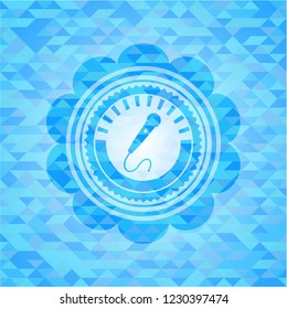 microphone icon inside light blue emblem with mosaic ecological style background