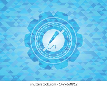 microphone icon inside light blue emblem with mosaic background