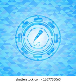 microphone icon inside light blue emblem. Mosaic background