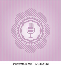 microphone icon inside pink icon or emblem