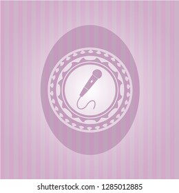 microphone icon inside pink icon or emblem