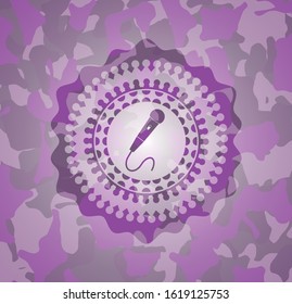 microphone icon inside pink and purple camouflaged emblem