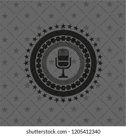 microphone icon inside realistic black emblem
