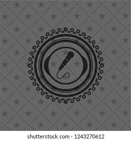 microphone icon inside realistic dark emblem