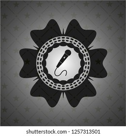microphone icon inside realistic dark emblem
