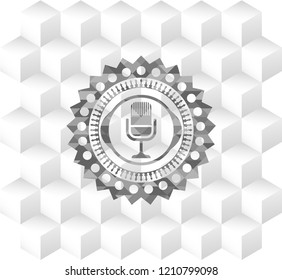 microphone icon inside realistic grey emblem with cube white background