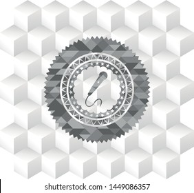 microphone icon inside realistic grey emblem with geometric cube white background
