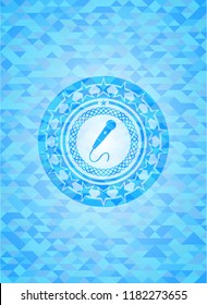 microphone icon inside realistic light blue mosaic emblem