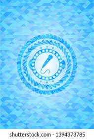 microphone icon inside realistic light blue emblem. Mosaic background