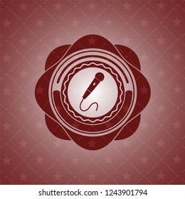 microphone icon inside realistic red emblem