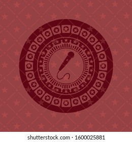 microphone icon inside realistic red emblem