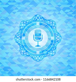 microphone icon inside realistic sky blue emblem. Mosaic background