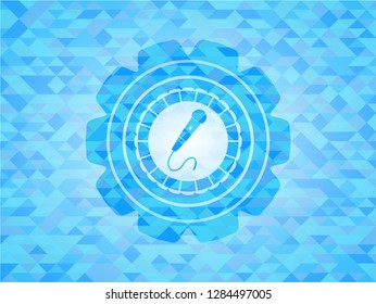 microphone icon inside realistic sky blue mosaic emblem