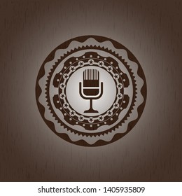 microphone icon inside realistic wood emblem