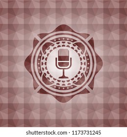 microphone icon inside red emblem or badge with abstract geometric polygonal pattern background. Seamless.