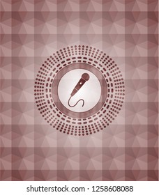 microphone icon inside red emblem with geometric background. Seamless.