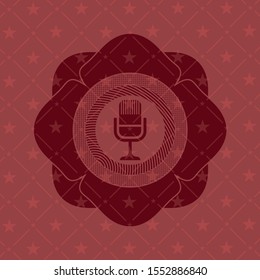 microphone icon inside red icon or emblem